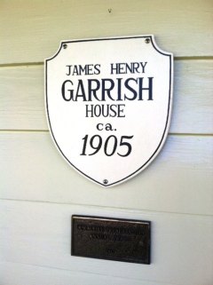 Len Skinner makes the shields for OPS to sell to historic homeowners. The bronze plaque is the 2007 Preservation Award. 